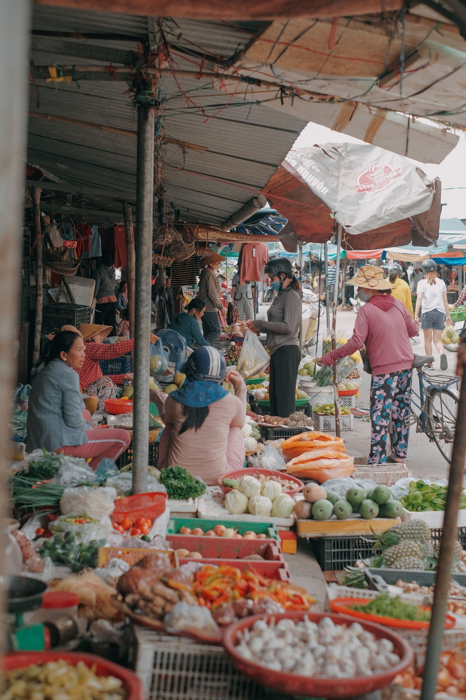 A bustling outdoor produce market